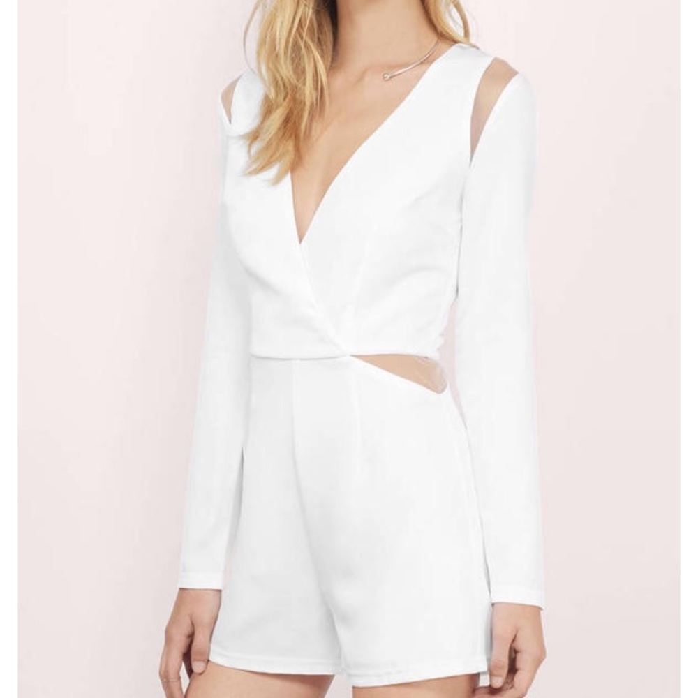 Brand new white romper with sheer cutouts